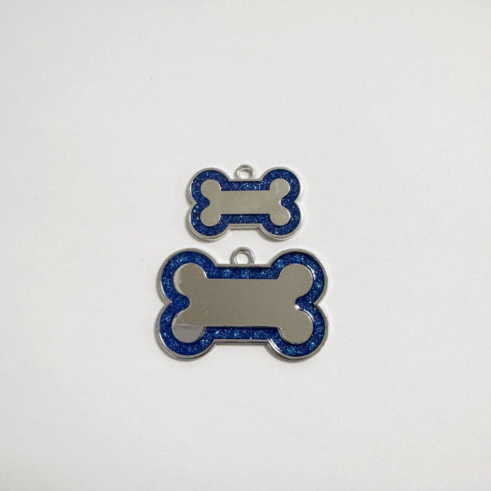 Aleación de zinc perro anti-perdida hueso transfronterizo borde polvo flash pet collar colgante etiqueta colgante grabación láser