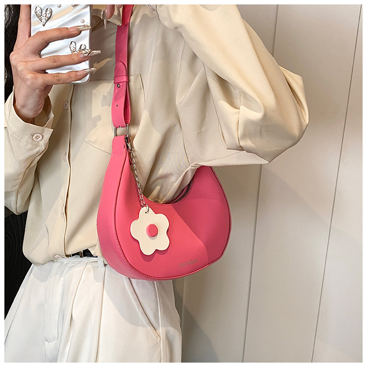 Cross-border women's bag 2024 New style, trendy texture, versatile, ins fashion single-shoulder armpit bag, small flower pendant, crescent moon bag undefined