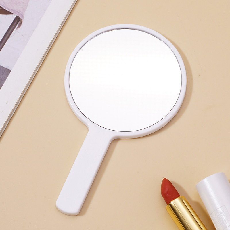 Espejo redondo de alta definición con logo impreso, espejo de maquillaje portátil, espejo pequeño de mano para retoques, regalo de belleza, venta al por mayor.