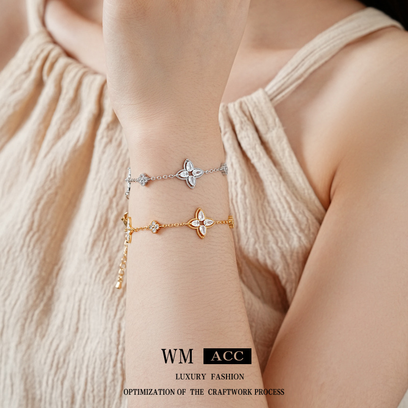 Brazalete de flores de oro real, pulsera de piedra de diamante, simple y de alto nivel, pulsera universal, nicho, lujo ligero, joyas de mano exquisitas para mujeres.