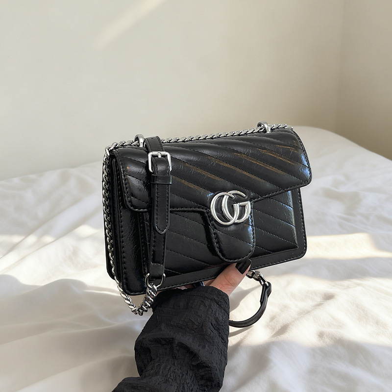 Comercio exterior bolso de explosión simple retro ondulado bolso de amor bolso de hombro para mujeres sensación de diseño de lujo ligero