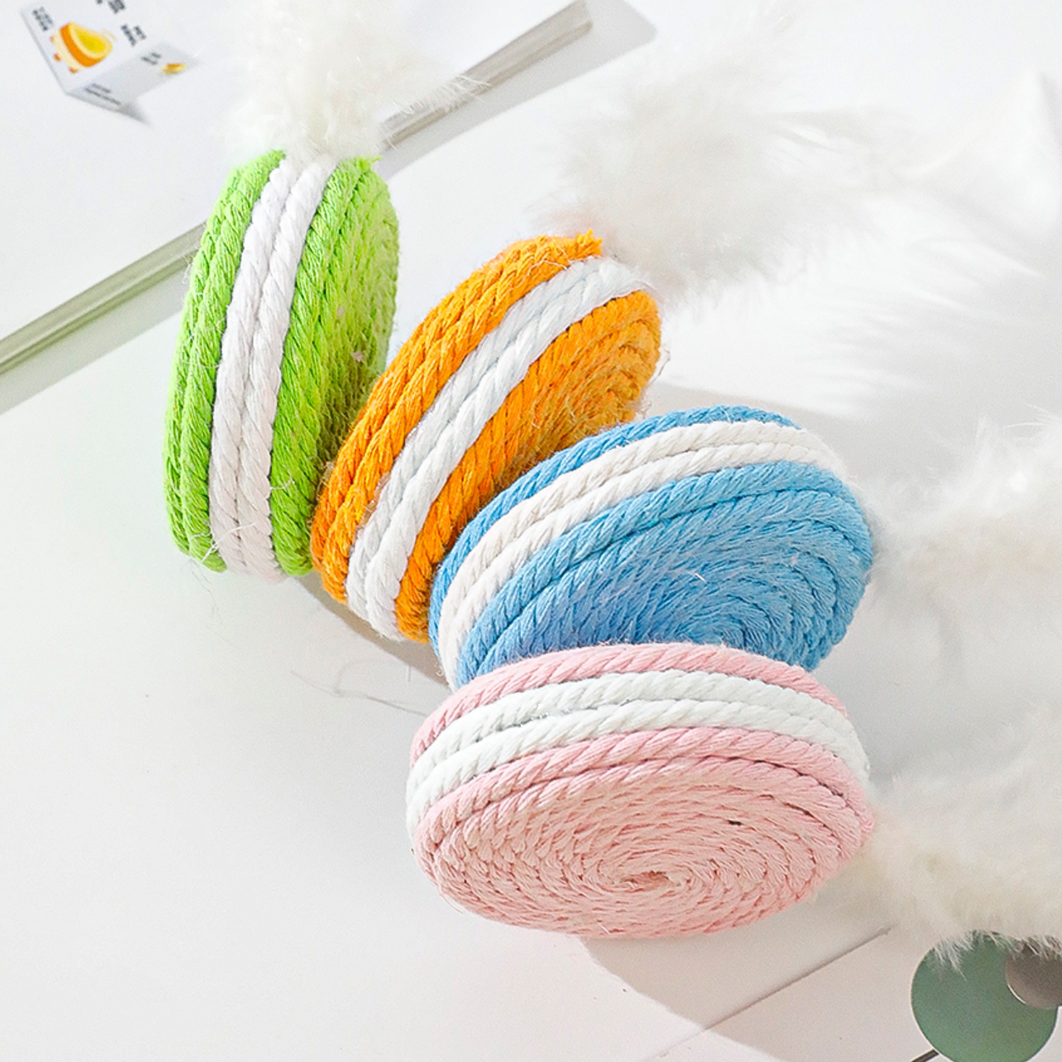 Los fabricantes de juguetes de cuerda de algodón para mascotas almacenan tarjetas colgantes al por mayor Macarons Serie de cuerda de algodón Juguetes para gatos Explosiva transfronteriza Mascotas