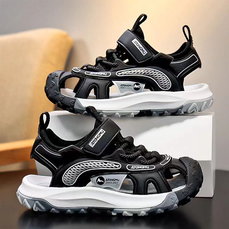 Niños sandalias Baotou 2026 verano nuevo estilo de moda para niños zapatos de playa para niños zapatillas suaves zapatillas individuales