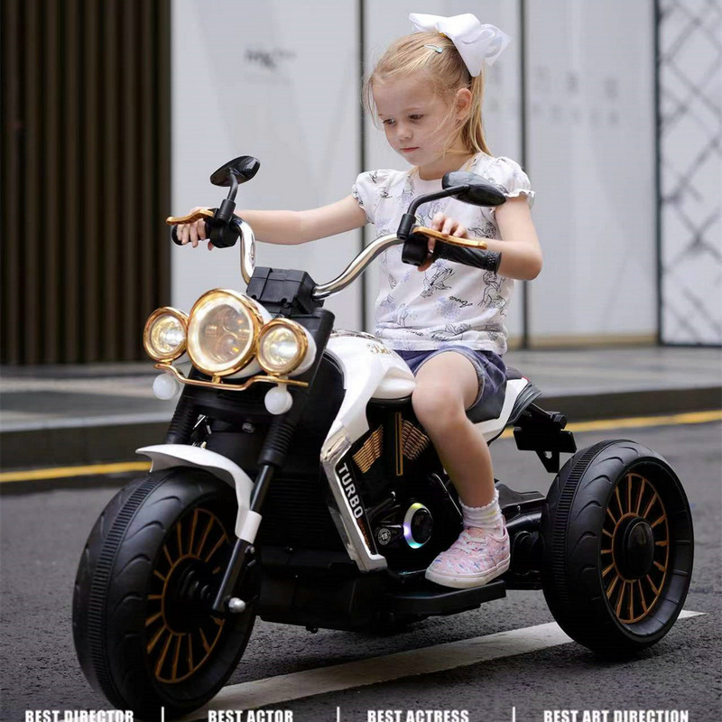 El cochecito de auto-conducción del jugador de los nuevos niños de la motocicleta eléctrica de los niños puede sentarse motocicleta recargable de tres ruedas del bebé