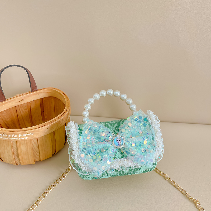 Primavera y verano nueva celebridad en línea bolso de los niños moda Chanel estilo princesa bolsa pequeña niña linda bolsa de mensajero portátil al por mayor
