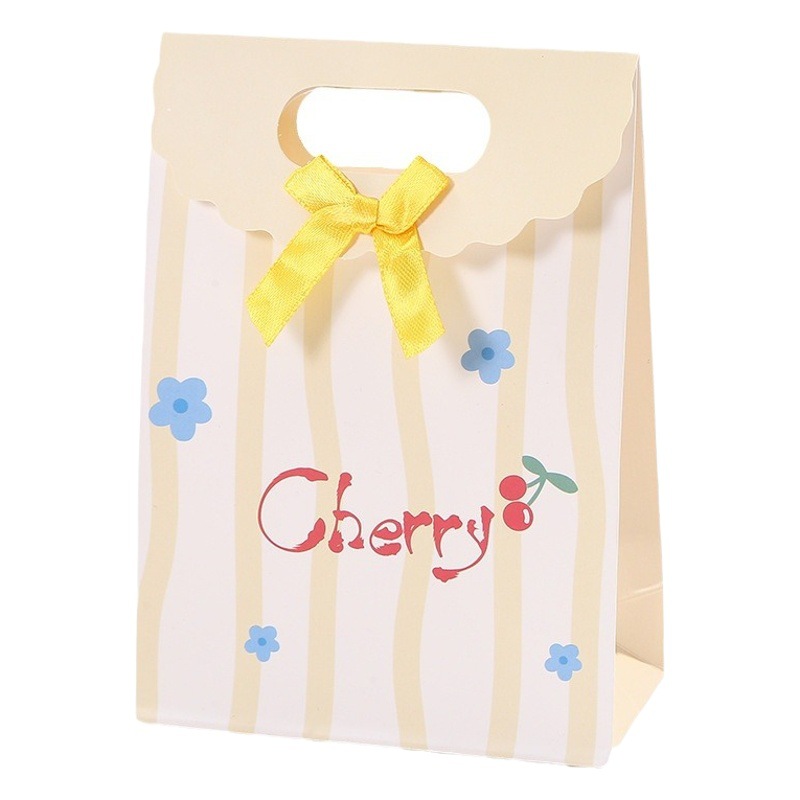 Bolsa de regalo de arco rayado de dibujos animados bolsa de embalaje de postre impresión en color Flip bolso de cartón blanco bolso