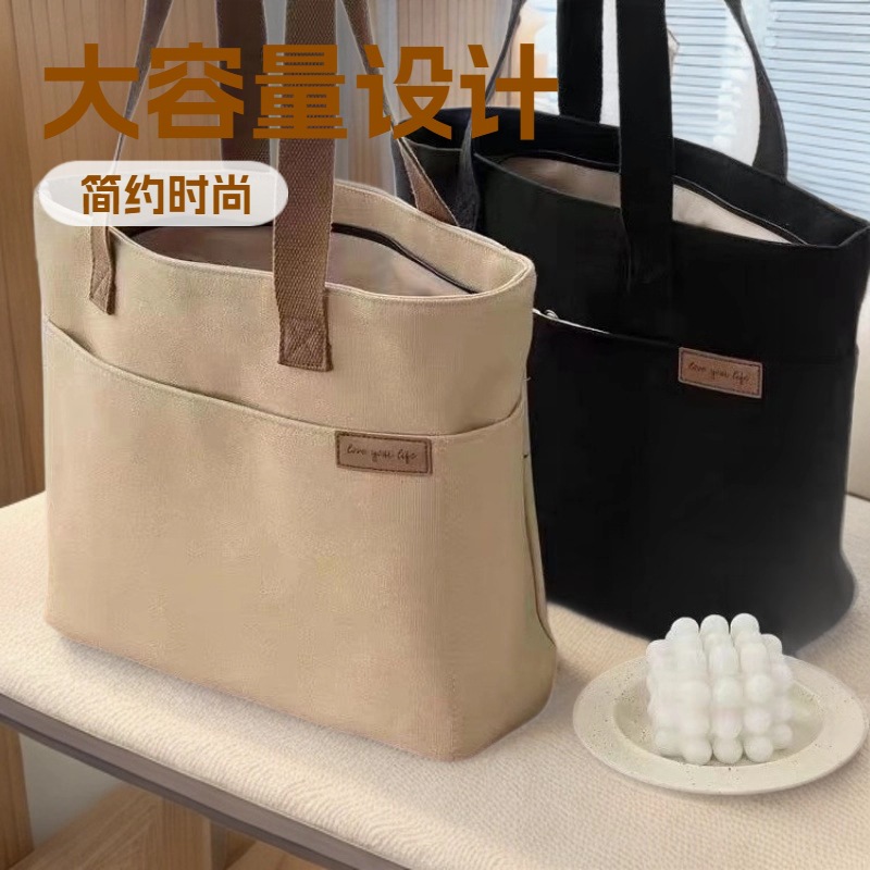 原创设计加厚有型简约百搭通勤帆布托特包休闲文艺学生单肩手提包
