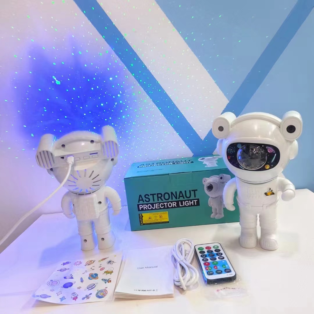 Transfronterizo astronauta lámpara de proyección controlada por voz Aurora cielo estrellado atmósfera Spaceman lámpara Bluetooth música proyector luz de la noche