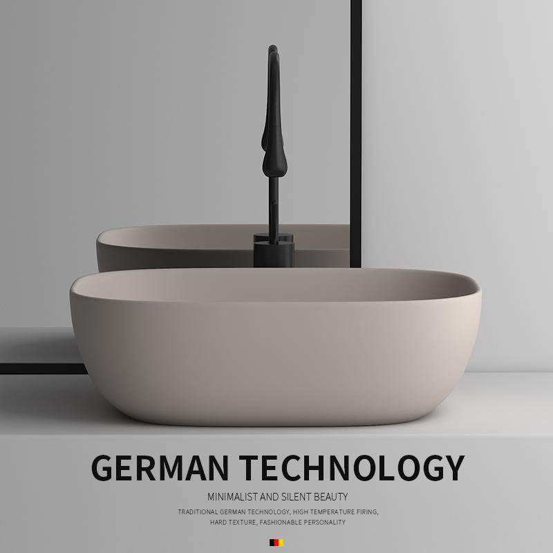 Artistic high-end console washbasin face basin single hand wash basin balcony wash basin elliptical ceramic basin matte khaki color