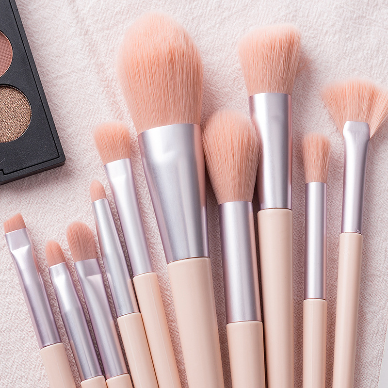 Nuevo puente Rosa 10 anti-lana maquillaje cubierta refrescar mano práctico cepillo conjunto en stock al por mayor