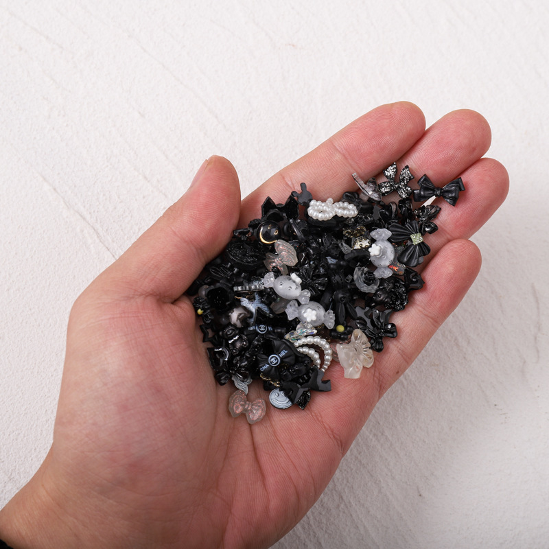 Cross-border nail Bow accesorios Diamond 100 mezcla de resina hecha a mano Rosa tridimensional negro blanco Aurora