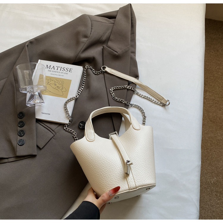 Bolso de madre de cubo de ocio simple para mujer 2025 versión coreana del nuevo bolso de mensajero exquisito de textura de moda ins