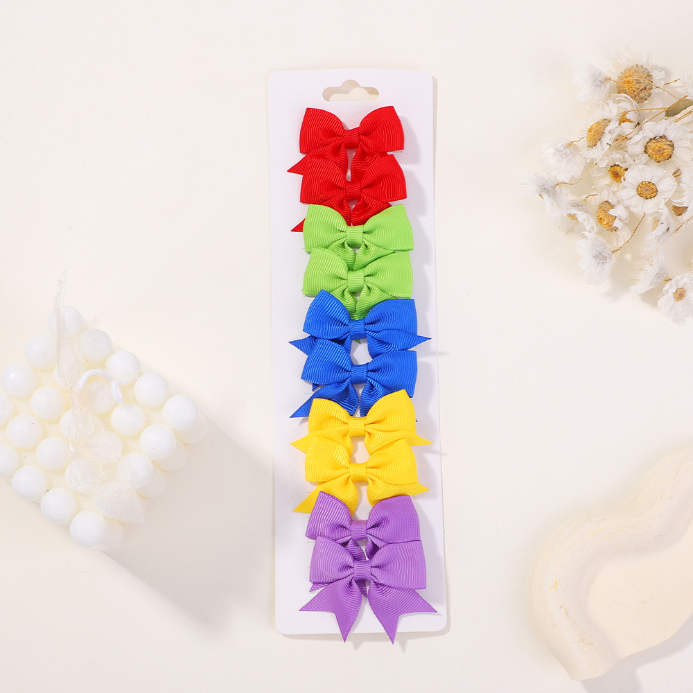 Juego de horquillas con lazo de cola de milano para niños de estilo caliente de Amazon, lindo y versátil, horquilla diaria para niñas europeas y americanas 323