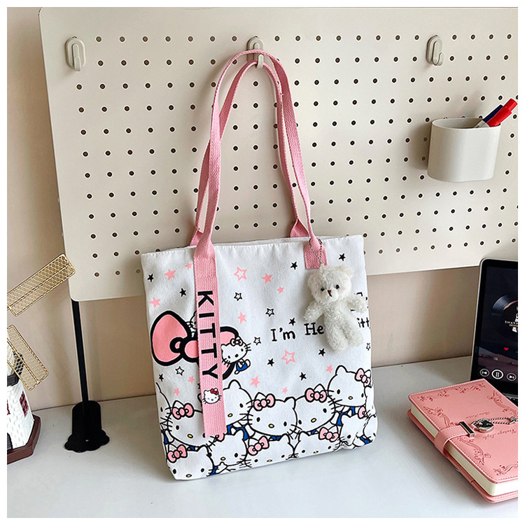 The new fashionable cartoon canvas bag, simple and versatile tote bag, cute commuting single-shoulder tote large bag, is selling well across borders undefined