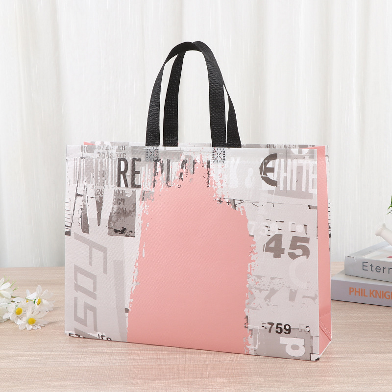 Bolso grueso de tela no tejida Bolso de compras de ropa no tejida para hombre Bolso de mano de regalo con impresión en color de película