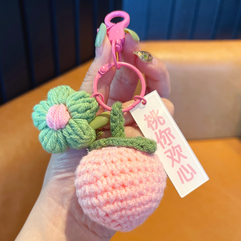 Buena noticia en línea rojo de punto clave colgante tejido lana bolsa adornos lindo femenino exquisito coche llavero