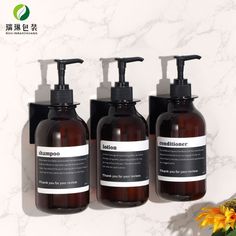 Botella de loción corporal de 300 ml en stock con hombros redondeados, botella dispensadora de plástico tipo pulsador para loción, botella de champú de PET de 500 ml.