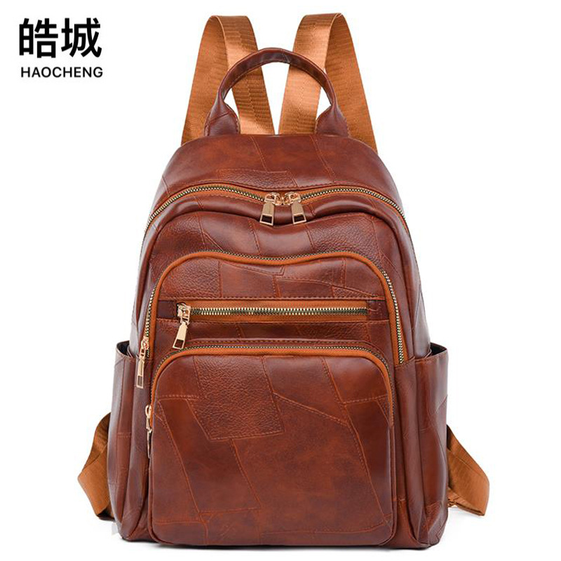 Mochila femenina 2024 nueva mochila de cuero suave simple de gran capacidad bolso ligero de moda bolso de viaje de viaje