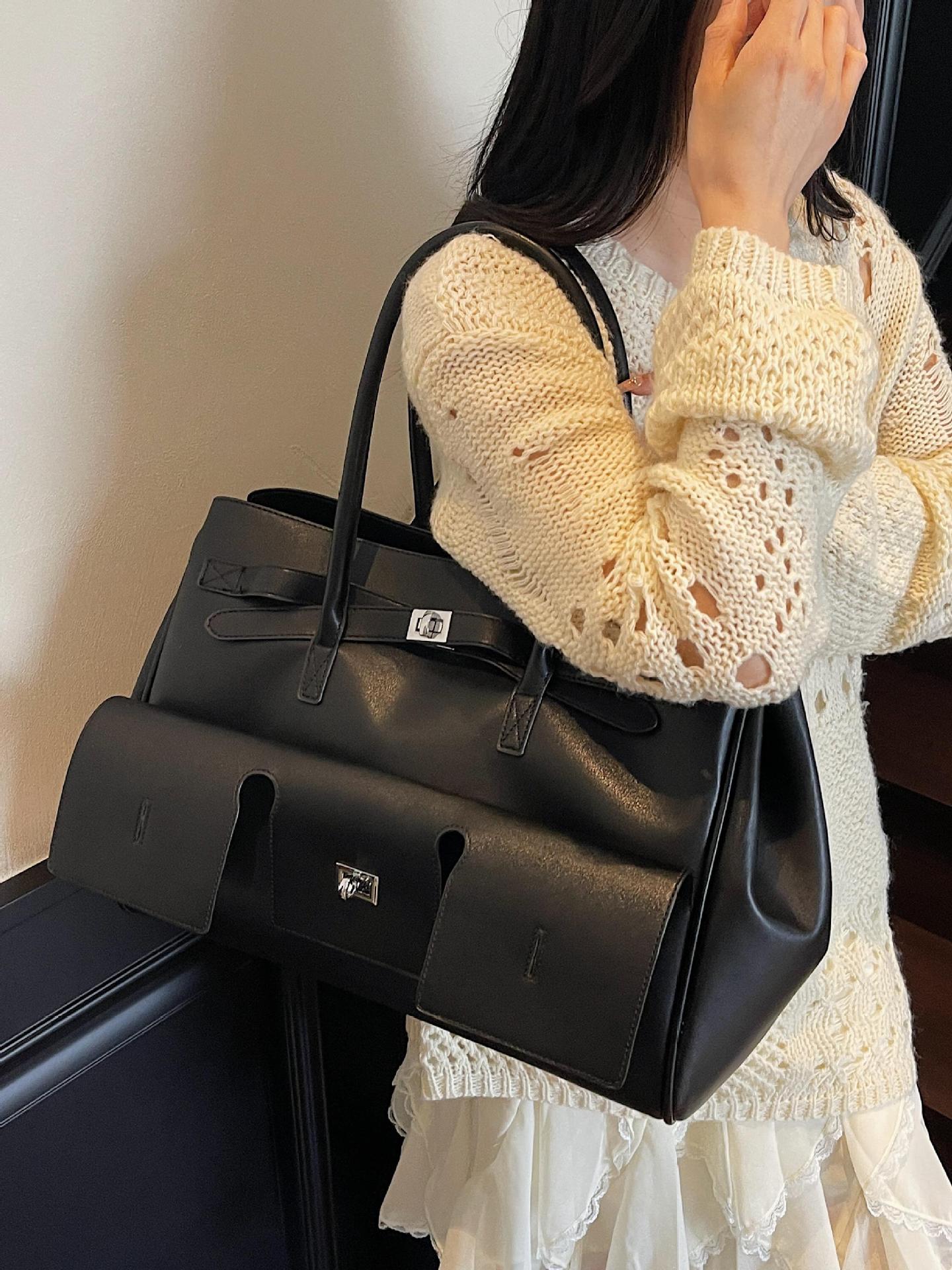 Bolso de viaje portátil retro explosivo transfronterizo 2025 nuevo maletín casual versátil bolso de alta gama de un solo hombro