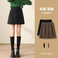 秋冬毛のショートスカートの女性の小さいズボンのスカートは股のa字のスカートを遮ります。