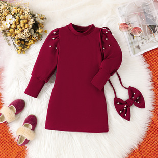 Amazon Europe and the United States autumn and winter new girls dress solid color children's long sleeve dress with bow decoration