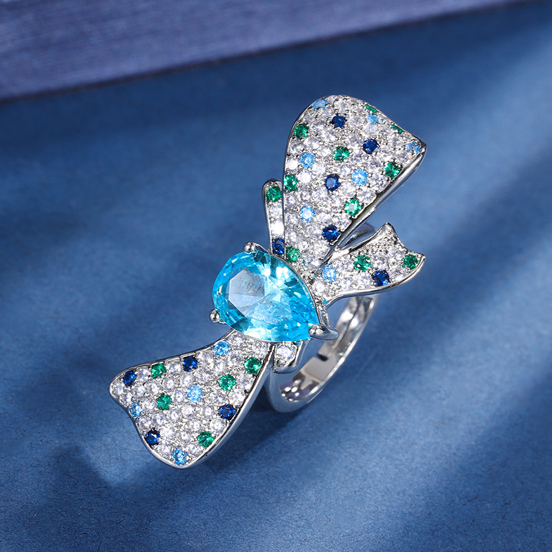 Zhuang Sheng joyas de cobre inferior chapado en oro coreano ins moda simulación color tesoro arco anillo piedra principal 8*14