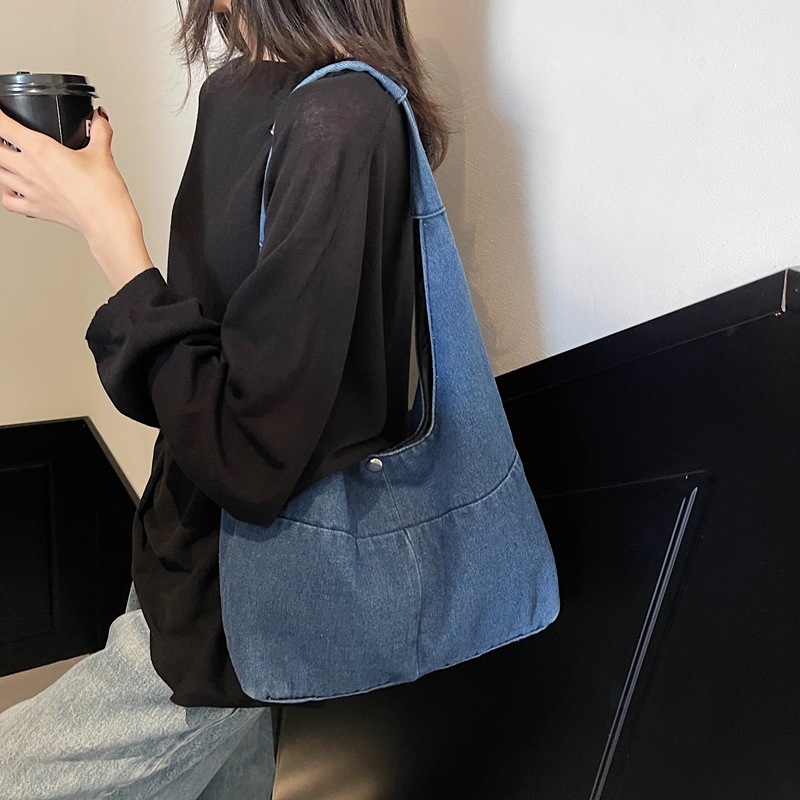 Bolso de mezclilla de gran capacidad 2025 nuevo bolso de hombro casual de primavera de moda bolso de axila retro literario al por mayor