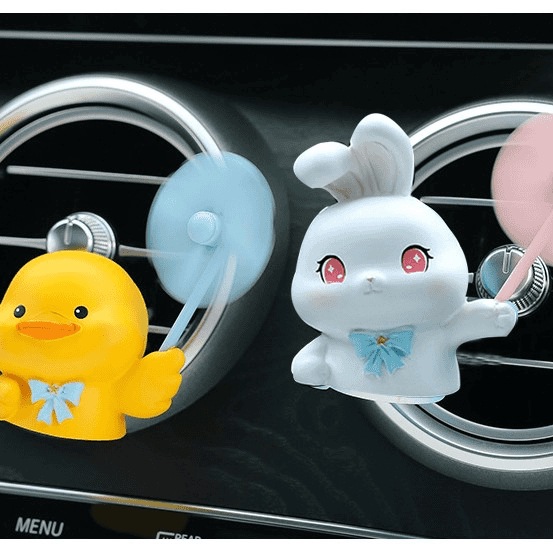 Aire acondicionado del automóvil salidas de aire decoraciones aromáticas dibujos animados lindo cerdo coche eléctrico consola adornos de perfume montados en el automóvil