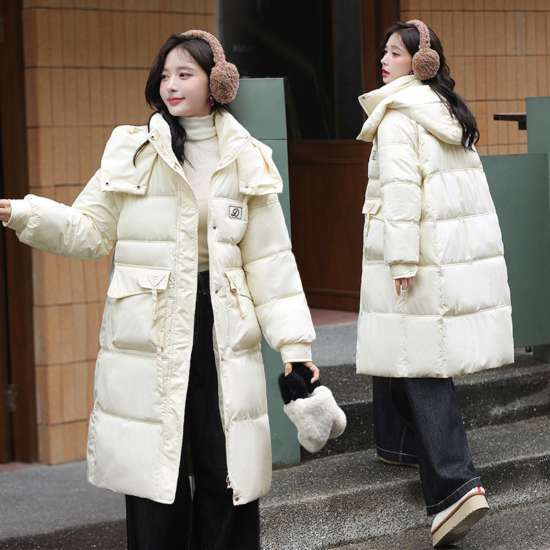 2025 invierno nuevo largo estilo coreano suelto chaqueta de pluma de algodón para mujeres laca engrosada chaqueta de algodón con capuz