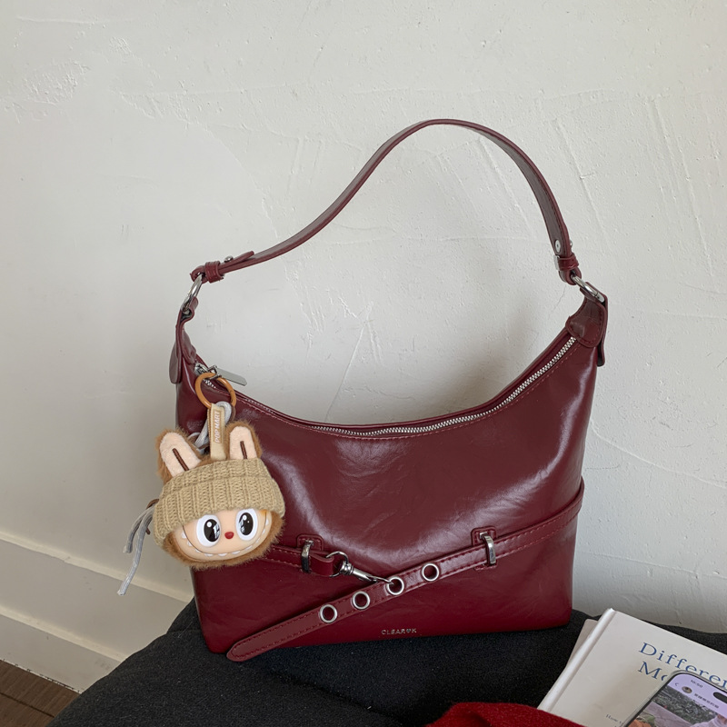 Bolsa de bolsillo de nicho francés de estilo extranjero para mujeres 2025 nueva moda versátil bolso de hombro de brazo de viaje bolso de hombro de hombro