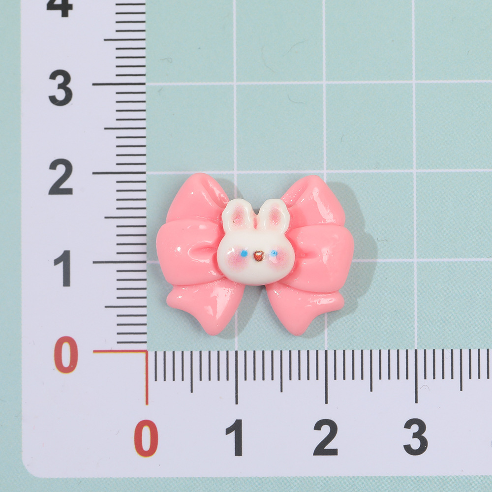 Dibujos animados macaron mariposa conejo resina accesorios DIY crema pegamento horquilla accesorios para el cabello teléfono móvil Shell material hecho a mano al por mayor