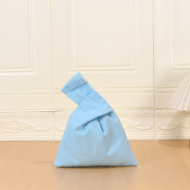 Bolsa de mano azul claro 31 * ancho 22 cm de altura