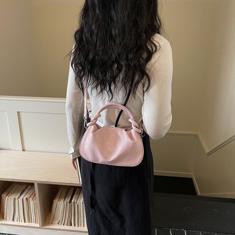 Textura de bolso de mano para mujeres 2026 nueva moda moda diaria de viaje de nicho coreano bolso de hombro