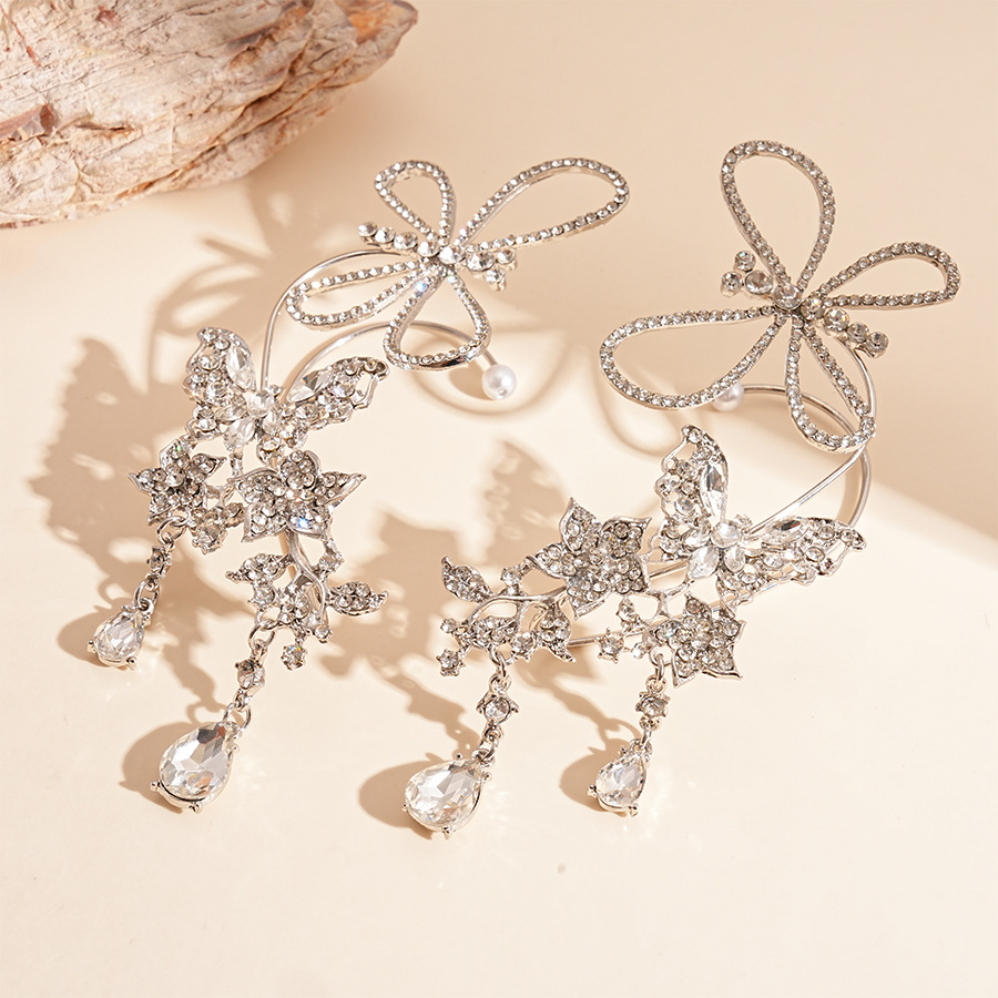 Súper destello y luz, estilo de lujo, mariposa con incrustaciones de diamantes, gotas de agua, orejas huecas, sin perforaciones, personalidad, temperamento de nicho, pendientes de sentido avanzado, mujeres