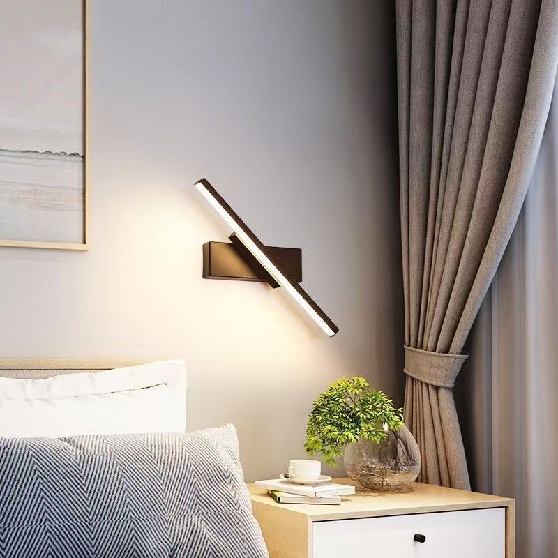 La lámpara de pared de la cabecera de la cama del dormitorio se puede girar en un ángulo ajustable. Iluminación LED para interiores. Lámpara de pared de tira de personalidad minimalista. Dormitorio principal