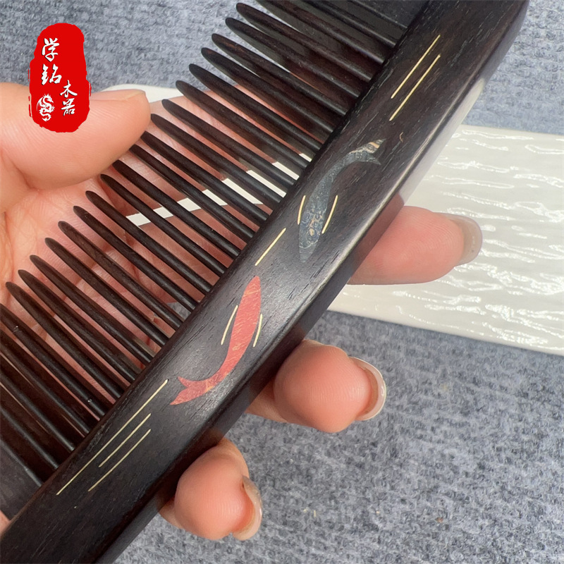 紫光檀は花を入れて魚の櫛を挿します。|undefined