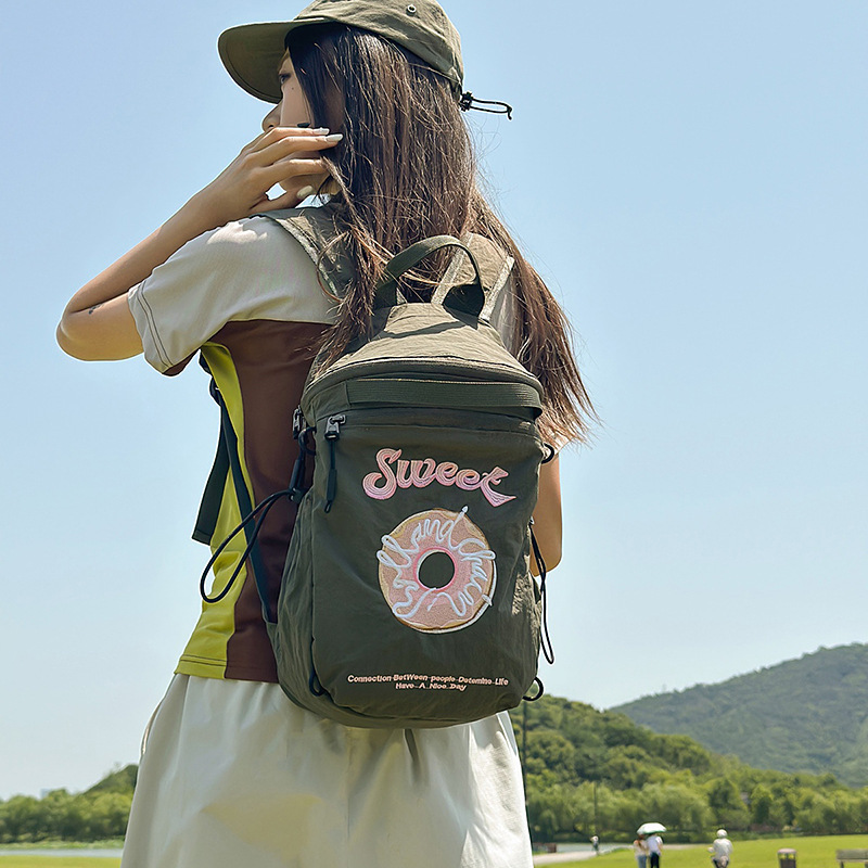小型軽量ドーナツ刺繍巾着バッグ、小さくて可愛らしいリュックサック、アウトドア旅行やレジャーに最適なバックパック|undefined