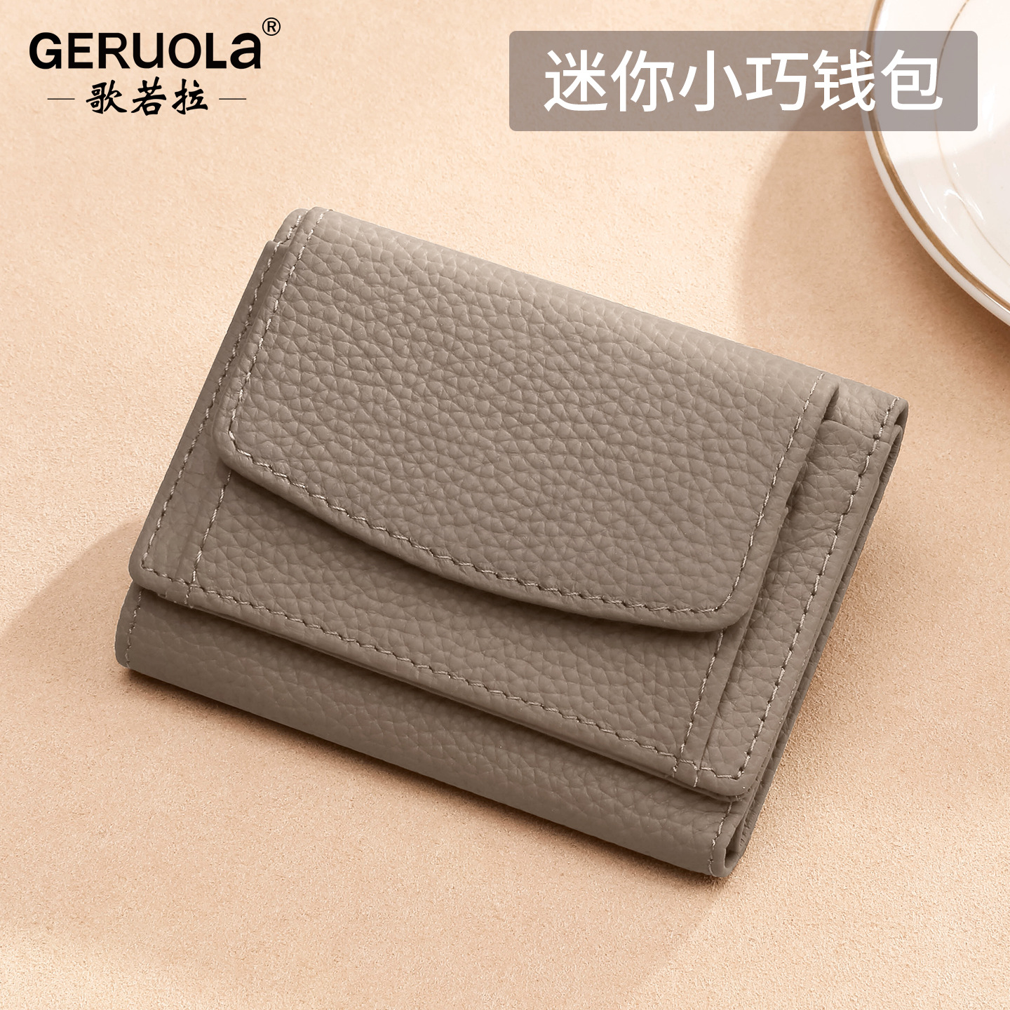 Comercio exterior nueva primera capa de cuero pequeño bolso de monedas de cuero real bolso de monedas de estilo japonés 2 plegable bolso corto de mujeres venta caliente
