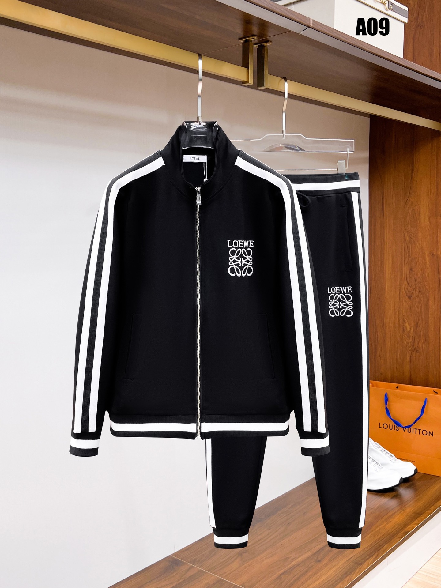 25 años de otoño y invierno de alta calidad nuevo estilo P casa marca de moda cardigan casual suéter deportivo conjunto de parejas