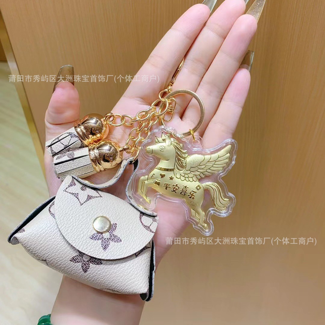 Año del Caballo de oro llavero de automóvil pequeño colgante 999 dinero de inmediato bolso llavero personalizado pequeño regalo