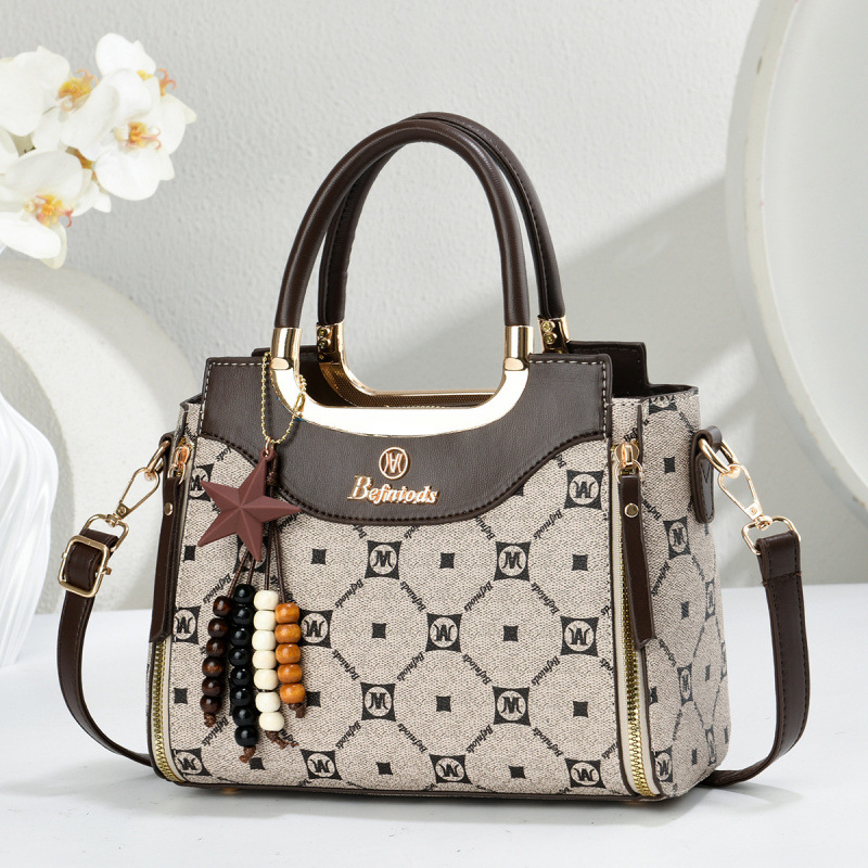 Bolsas de mano de moda casuales con estrellas colgantes, bolsas de hombro, bolsas de transporte aéreo, bolsas de mujer transfronterizas