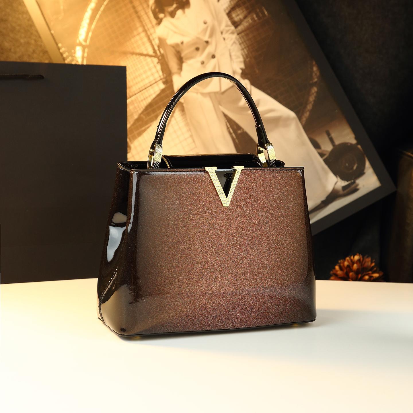 Bolso de gran capacidad para madres 2025, nuevo temperamento lujoso, bolso de mano de mujer de hombro de moda, bolso de cuero de mediana edad.