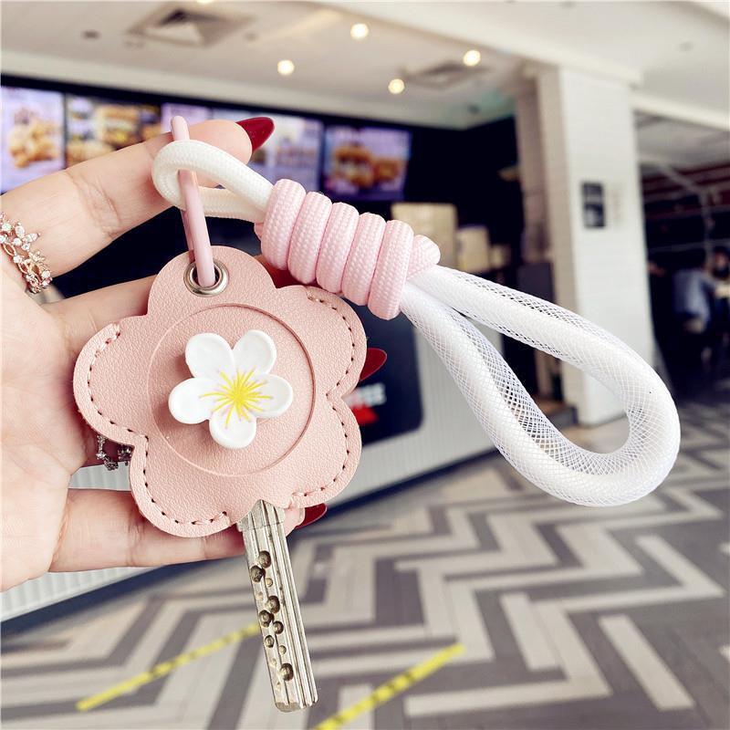 Cubierta de la llave nuevo corazón de niña explosiva Llavero Coche eléctrico PU Cubierta de la tarjeta de control de acceso para el hogar Sensor de gota de agua Amazon