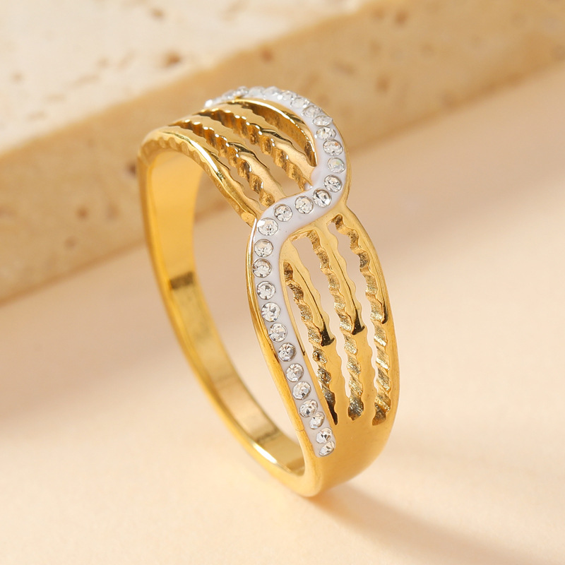 Anillo de acero inoxidable de lujo ligero europeo y americano exagerado personalidad de corte hueco línea multicapa incrustada de cerámica diamante joyería anillo