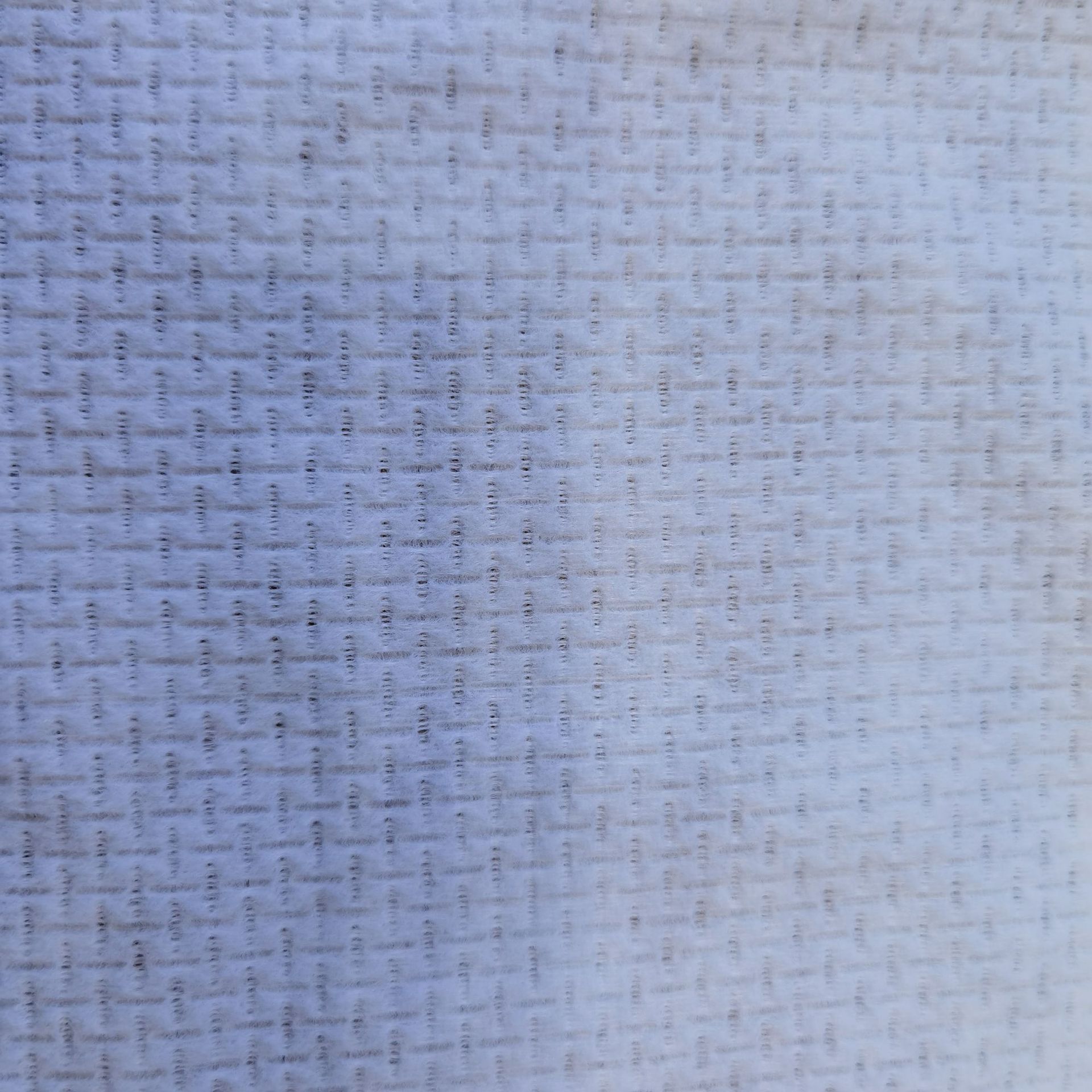 擦拭布湿面巾魔术毛巾材料卫生水刺无纺布网纹