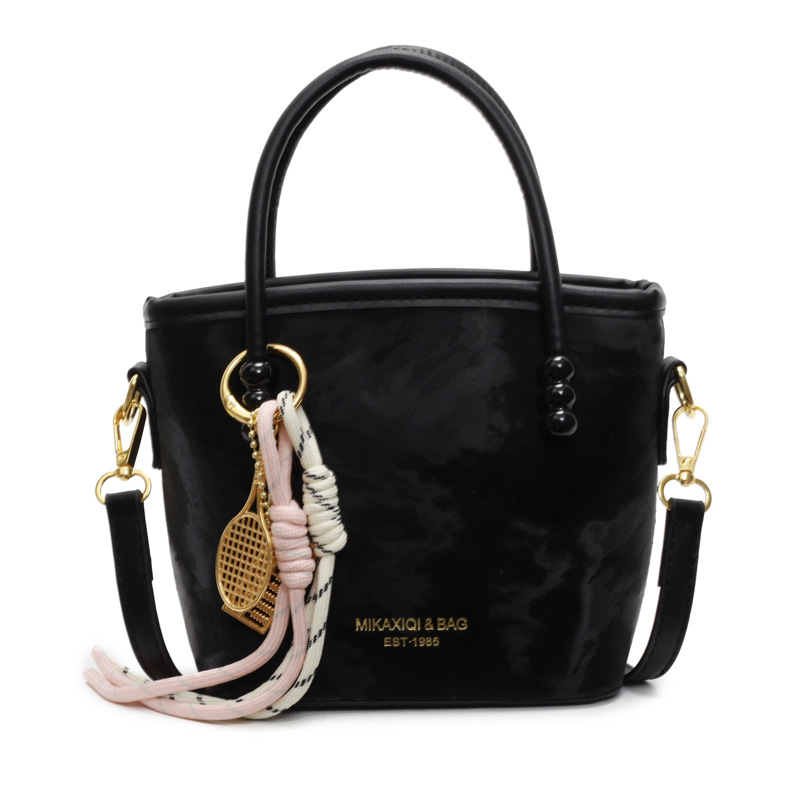 Comercio exterior venta caliente bolso de cubo de mano damas 2025 nuevo estilo de tendencia universal bolso de hombro de alta calidad bolso de moda