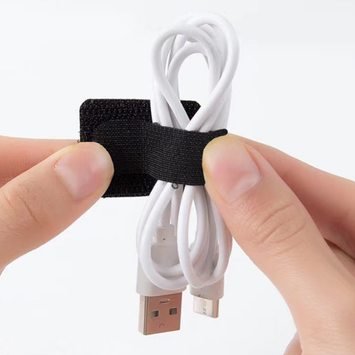 Magic cable tie adhesive wholesale household anti-tangle computer charging cable organizer with adhesive backing data cable storage