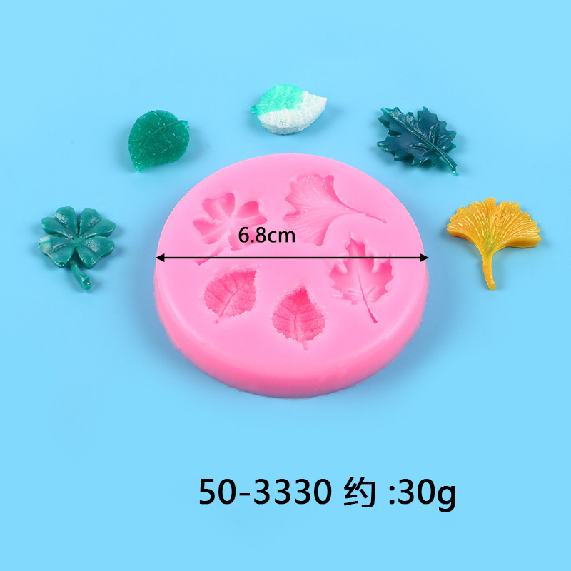 いくつかの草の葉のカエデの葉の形の液体のシリカゲルの鋳型のdiyはあめのケーキの石膏をひっくり返してゴムの鋳型を垂らします。|undefined