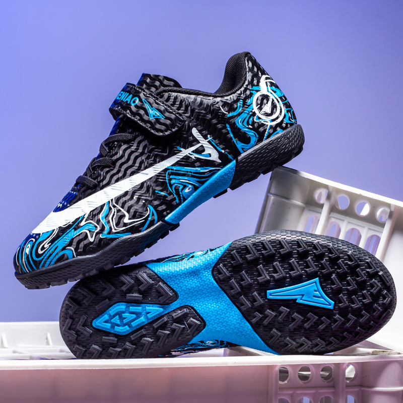 Zapatos de fútbol transfronterizos de alto perfil para hombres TF zapatos de entrenamiento antideslizante transpirables para niños zapatos deportivos profesionales para estudiantes