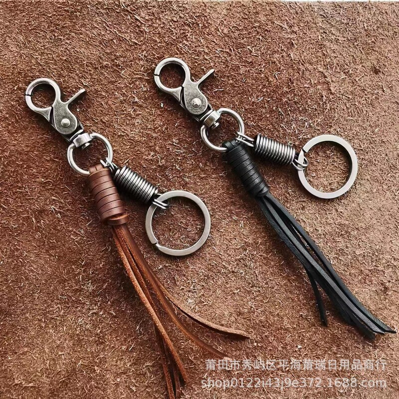 Handmade car keychain four-strand woven Creative cowhide tassel simple waist hanging alloy dog chain key ring pendant